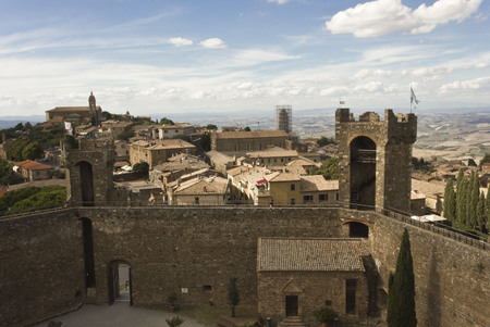 Montalcino, Italy: View of Montalcino city from its Castle, an ancient building symbol of the cityのeditorial素材