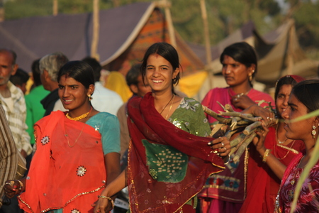 PUSHKAR, INDIA : Indian girls with traditional colored saree on the street of Pushkar during the Camel Fair exhibitionのeditorial素材