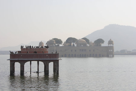Jal Mahal, meaning Water Palace  in a foggy day. The Palace is a palace located in the middle of the Man Sagar Lake in Jaipur city, Indiaのeditorial素材
