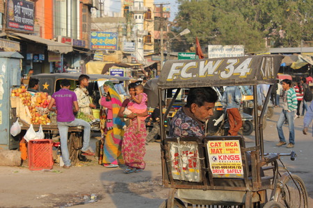JAIPUIR, INDIA : Daily Life in Jaipur, with its traffic and people walking along the streetのeditorial素材