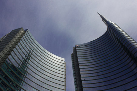 MILAN, ITALY - MAY 10 2014: Architectural detail of the glass facade on the Unicredit tower building in Milan, the tallest skyscraper in Italyのeditorial素材
