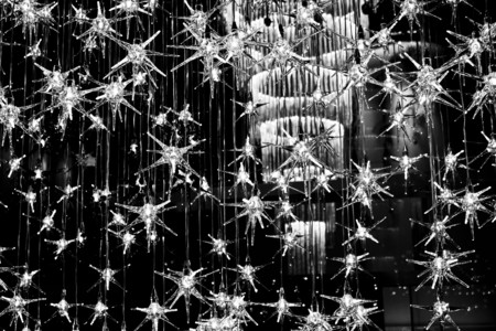 MILAN, ITALY - APR 9: Beautiful suspension lights installation by Reflex at Milan Furniture Fair on April 9 2014. Black and white imageのeditorial素材