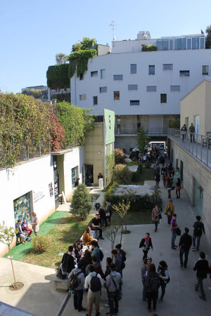 MILAN, ITALY - APR 11: View from the top of the Ventura Lambrate District in Milan during the Milan Furniture Fair, with people walking around, on April 11 2014のeditorial素材