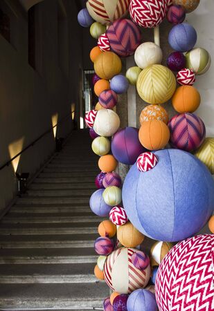 MILAN, ITALY - APR 8: University of Milan main staircase during the Milan Furniture fair on April 8 2014, with a colorful design installation by Ferruccio Laviani of textile ballsのeditorial素材