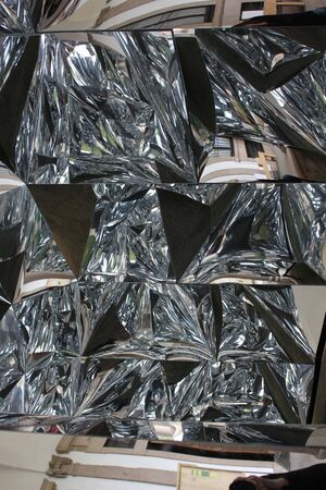 MILAN, ITALY - APR 8: Design installation Windowscape by architect Yoshiharu Tsukamoto during the Salone del Mobile 2014 at the University of Milan, with mirrors reflecting one on each other.のeditorial素材