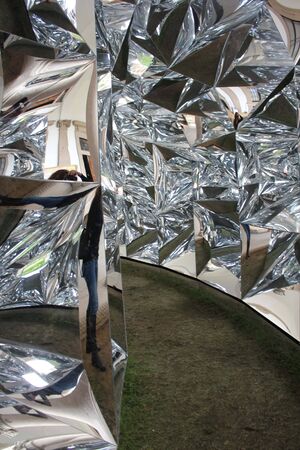 MILAN, ITALY - APR 8: Design installation Windowscape by architect Yoshiharu Tsukamoto during the Salone del Mobile 2014 at the University of Milan, with mirrors reflecting one on each other.のeditorial素材