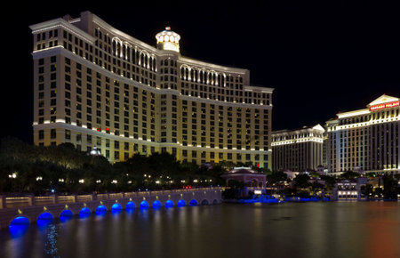 LAS VEGAS, USA - AUG 5: Night view of the famous Bellagio Hotel in Las Vegas, and the Caesars Palace, on August 5 2012のeditorial素材