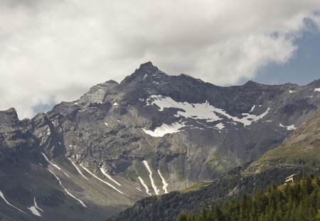 MADESIMO, ITALY - AUG 21: Overview of the peek of a mountain in summer season, with its glacierのeditorial素材