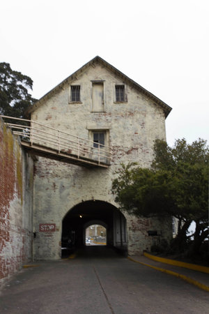 ALCATRAZ, USA - AUGUST 12 2013: Inside Alcatraz Penitantiary, oudoor view of the ancient building