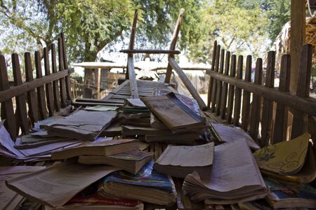 Bagan, Myanmar - March 2 2014: Vintage school in a little village near Bagan, in Myanmar. The open-air school, with straw roof and wooden desk, has only a blackboard and few seats for the students of the village.のeditorial素材