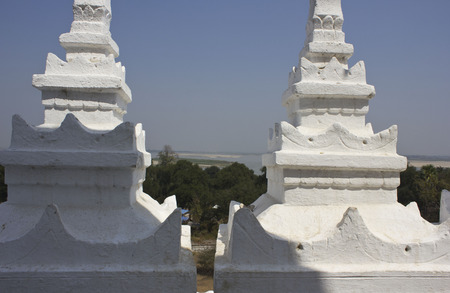 Mingun, Myanmar - March 2014: Hsinbyume or Myatheindan pagoda in Mingun, is a beautiful white Pagoda with a distinctive architectural style modelled after the mythical Mount Meru. It is dedicated to the memory of his first consort Princess Hsinbyume.のeditorial素材