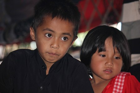 TANA TORAJA, INDONESIA - JULY 4 2012: Portrait of a young brother and sister in Indonesia, with a sad faceのeditorial素材