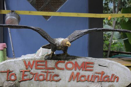 SULAWESI, INDONESIA -JULY 2 2012: Erotic Mountain welcome sign in Indonesia, South Sulawesiのeditorial素材