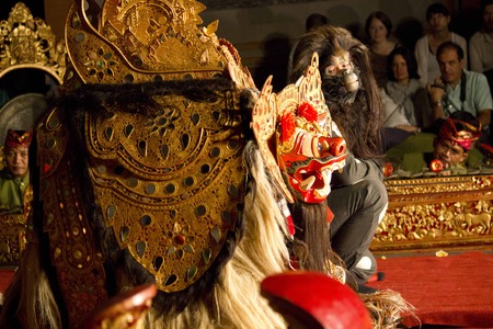 BALI, INDONESIA - JULY 6 2012: Traditional Balinese dance performance in the public Ubud Palace, with typical Balinese masks on the stageのeditorial素材