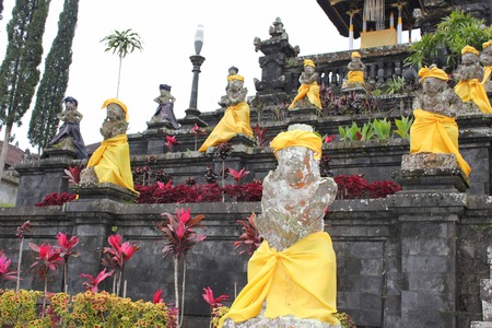 BALI, INDONESIA - JULY 7 2012: Besakih Mother Temple in Bali, sacred temple with all its statues, in a dull dayのeditorial素材