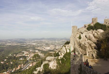 SINTRA, PORTUGAL - OCTOBER 25 2014: Castle of the Moors in Sintra, Portugal, with people walking in it, and beautiful surrounding landscapeのeditorial素材