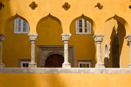 Architectural close up of arch columns in the court of Pena National Palace in Sintra, Portugalのeditorial素材