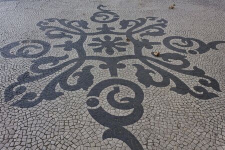 Close up of the artistic mosaic pattern on the sidewalk of Liberty Avenue in Lisbonのeditorial素材
