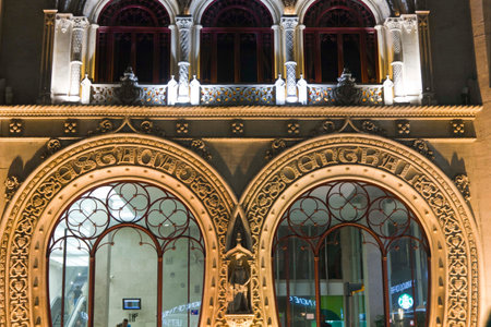 LISBON, PORTUGAL - OCTOBER 23 2014: Rossio Station main entrance illuminated at night, architectural detailのeditorial素材
