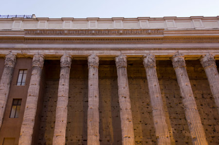 ROME, ITALY - DECEMBER 30 2014: Hadrian temple colonnade in Rome at sunset lightのeditorial素材