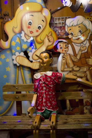 ROME, ITALY - DECEMBER 30 2014: Bartolucci window shop in Rome, with wooden manfufacture representing Pinocchio storyのeditorial素材