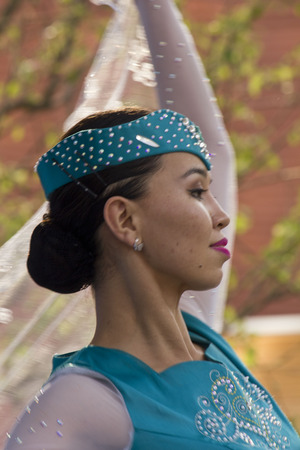 MILAN, ITALY - JUNE 29 2015: Portrait of a Kazaksthan dancer in traditional dress at Expo 2015 in Milanのeditorial素材
