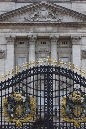 LONDON, UNITED KINGDOM - SEPTEMBER 11 2015: Architectural close up of iron Australia Gate with Buckhingham Palace behind, in London, United Kingdomのeditorial素材