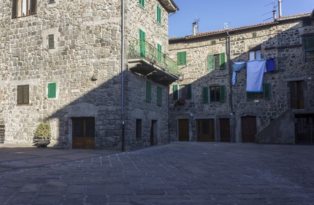 ABBADIA SAN SALVATORE, ITALY - JUNE 2 2017: historic city centre of the medieval city of Abbadia San Salvatore in Tuscany, Italyのeditorial素材
