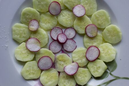 LASTRA A SIGNA - JULY 25 2015: Fresh salad of cucumbers and radishのeditorial素材