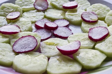 LASTRA A SIGNA - JULY 25 2015: Fresh salad of cucumbers and radishのeditorial素材