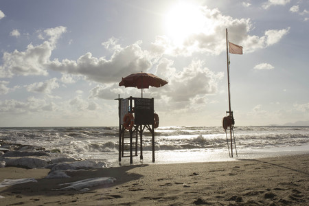 MARINA DI MASSA, ITALY - AUGUST 17 2015: Sunset view of a lifeguard tower at sunset time in Versilia, Italyのeditorial素材