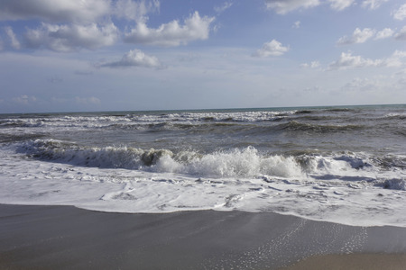 MARINA DI MASSA, ITALY - AUGUST 17 2015: Panoramic view of the Versilia shoreline in a summer rough sea day, nobody aroundのeditorial素材