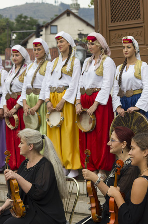 SARAJEVO, BOSNIA AND HERZEGOVINA - AUGUST 17 2017: Group of bosnian musician in front of sebilj fountain, traditionally dressedのeditorial素材