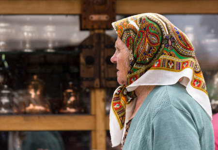 SARAJEVO, BOSNIA AND HERZEGOVINA - AUGUST 21 2017: Portrait of an elder woman walking in the street of sarajevoのeditorial素材