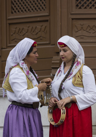 SARAJEVO, BOSNIA AND HERZEGOVINA - AUGUST 20 2017: Two bosnian girls traditionally dressed in sarajevoのeditorial素材