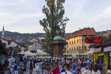 SARAJEVO, BOSNIA AND HERZEGOVINA - AUGUSt 18 2017: People around the famous Bascasija square in Sarajevo at sunset timeのeditorial素材