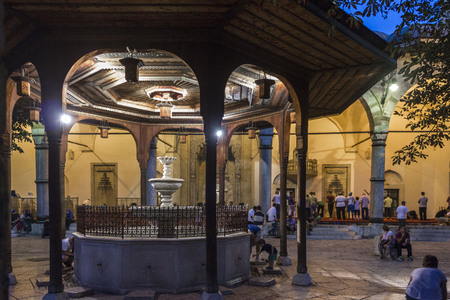 SARAJEVO, BOSNIA AND HERZEGOVINA - AUGUST 19 2017: People at night in the courtyard of Gazi Husrev Beg mosque in Sarajevoのeditorial素材
