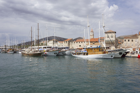 TROGIR, CROATIA - AUGUST 12 2017: Trogir waterfrint and harbour with boatsのeditorial素材