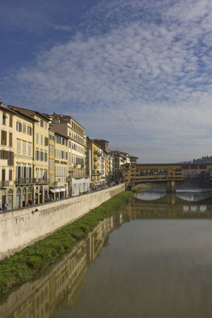 FLORENCE, ITALY - NOVEMBER 22 2015: Arno river and historic Ponte Vecchio bridge in Florenceのeditorial素材