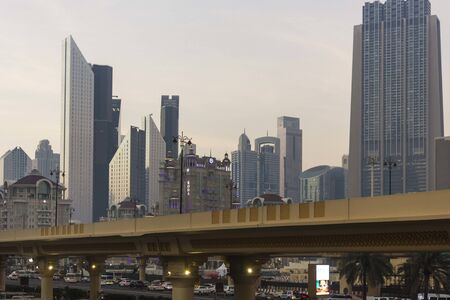 DUBAI, UAE - DECEMBER 25 2017: Modern buildings in Dubai at sunset lightのeditorial素材