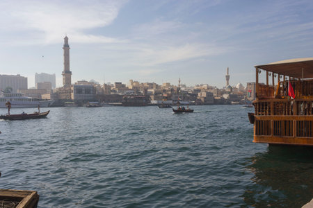 DUBAI, UAE - DECEMBER 26 2017: Dubai Creek withtraditional boats navigatingのeditorial素材