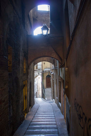 PERUGIA, ITALY - DECEMBER 10 2016: Ancient pedestrian road in Perugia city centreのeditorial素材