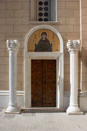 ATHENS, GREECE - AUGUST 13 2016: Details of a door of the metropolitan cathedral of Athens, Greeceのeditorial素材