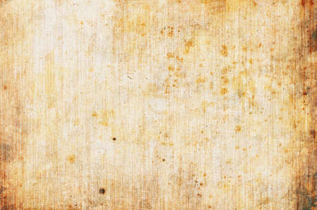 dirty grunge background with stains and in saind colorsの写真素材