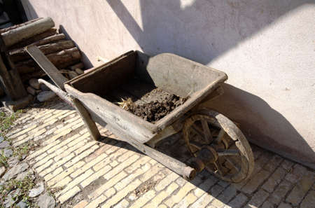 natural compost in a wheelbarrow in the french countryの写真素材