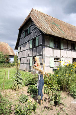 farm with scarecrown in the courtyardのeditorial素材