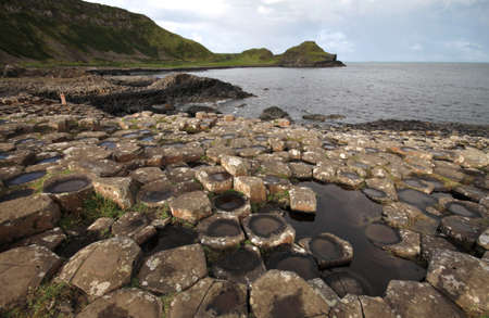 Giants Causeway stones and landscape, near Bushmills in Northern Irelandの写真素材