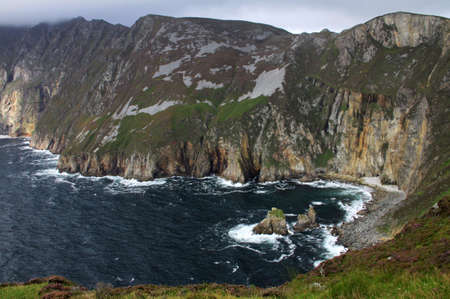 Slieve League cliffs with cloudy weather in Donegal, Ireland, panoramic viewの写真素材