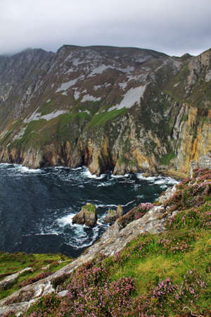 Slieve Leage cliffs and landscape on Atlantic ocean with cloudy weather in Donegal, Irelandの写真素材