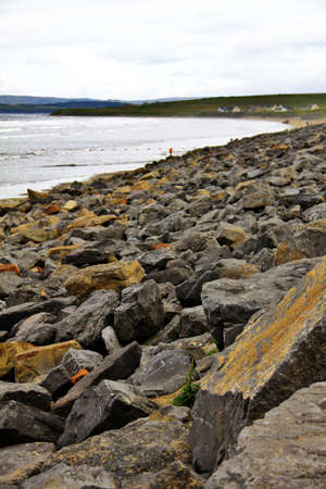 bad weather with wind, rain and clouds on irish coast in Sligo countyの写真素材